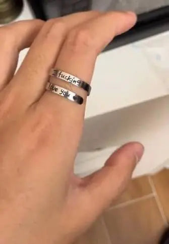 Hand wearing Minimalist Silver Spiral Wrap Statement Ring