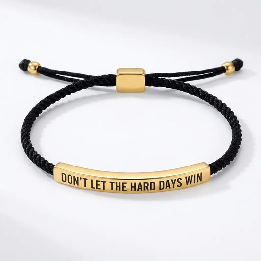 Don't Let The Hard Days Win braided affirmation bracelet in gold and black