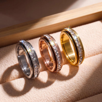 CalmSpin fidget ring set in silver rose gold and yellow gold
