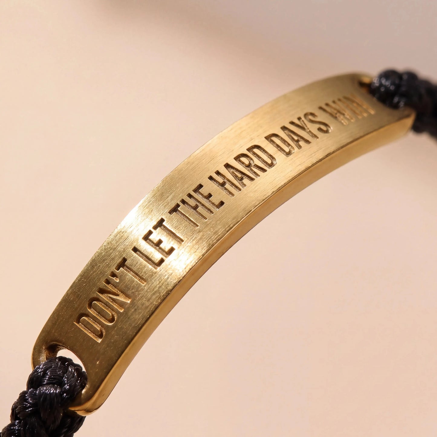 Engraved Don't Let The Hard Days Win tarnish-free gold bar detail