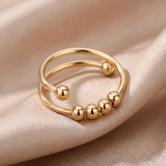 Open spiral anti-stress fidget ring in 18k gold plated tarnish-free stainless steel